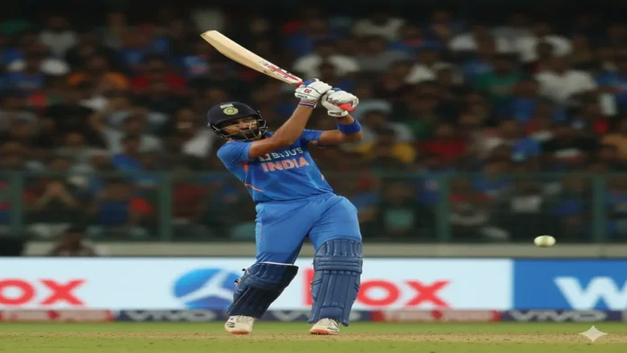 भारतीय बल्लेबाज अपने T20 मैच में आक्रामक शॉट खेलते हुए भारतीय क्रिकेट खिलाड़ी मैच में शॉट खेलते हुए, बैकग्राउंड में दर्शक और स्टेडियम दिखाई दे रहे हैं।